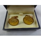 A pair of 9ct gold cufflinks set with half sovereigns, approx total weight 16.4g