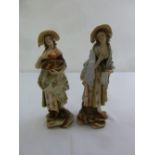 A pair of German 19th century porcelain figurines, marks to base