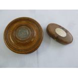 A circular oak snuff box fashioned from the mid 18th century ship the Royal George, the pull off