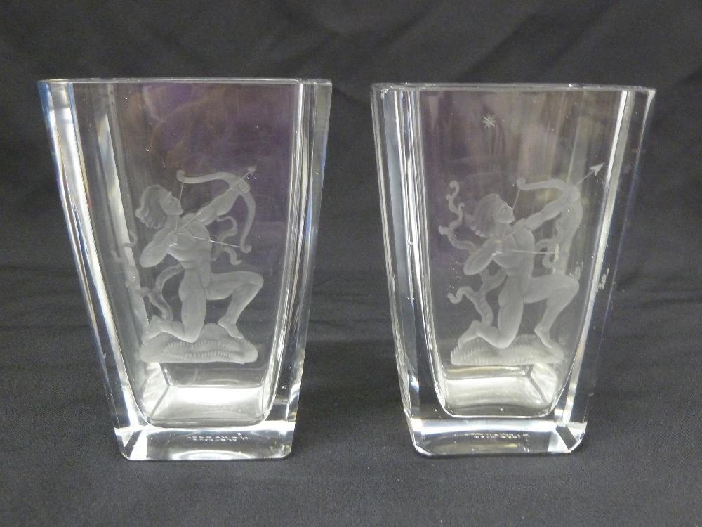 A pair of Swedish clear glass vases etched with classical archers