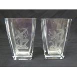A pair of Swedish clear glass vases etched with classical archers