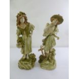 A pair of Czech ceramic figurines of a girl and a boy, A/F