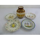 A Henriot Quimper baluster vase and four early Quimper faience plates