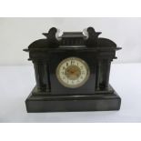 A Victorian rectangular black slate mantle clock on rectangular plinth