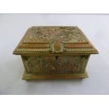 An electrotype brass and copper rectangular casket, the hinged cover and sides embossed with