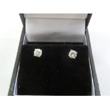18ct white gold and diamond ear studs, approx total weight 1.0g