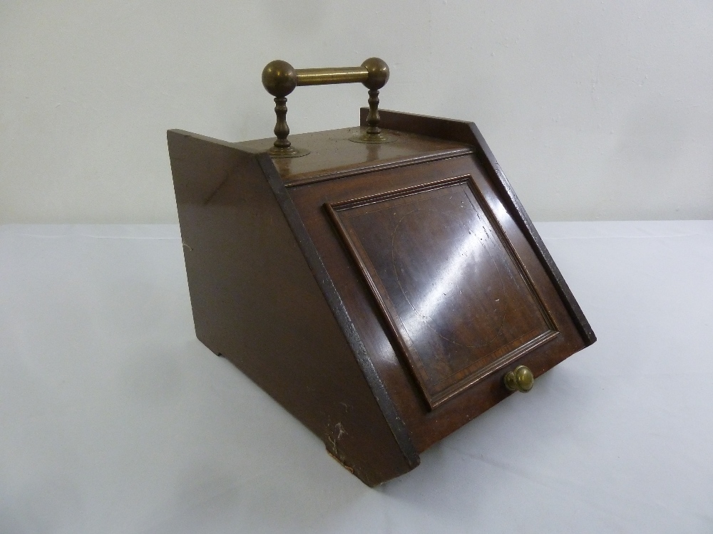 An Edwardian mahogany inlaid coal scuttle with brass carrying handle