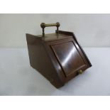 An Edwardian mahogany inlaid coal scuttle with brass carrying handle