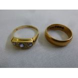 18ct gold dress ring and a 18ct gold wedding band, approx total weight 10.4g