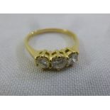 18ct yellow gold three stone diamond ring, approx total weight 2.7g