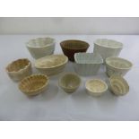 Ten 19th century ceramic jelly moulds of various shapes and forms