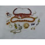 A quantity of costume jewellery to include necklaces, pendants and earrings