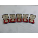 Five 1977 Queens Silver Jubilee silver crowns in fitted cases to include COAs