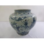 A Chinese early 20th century blue and white porcelain jardinière, decorated with warriors in a