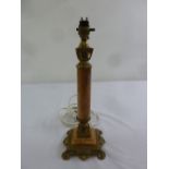 Red onyx columnular table lamp with applied gilded metal fittings