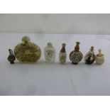 Seven Oriental snuff bottles of various shape and form