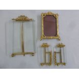 Four 20th century rectangular gilded metal picture frames
