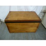 Army and Navy rectangular wooden trunk with brass handles and metal border, lined with sandalwood