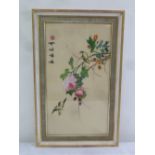 An Oriental framed and glazed silk picture depicting birds and flowers signed top left, 55 x 30.5cm