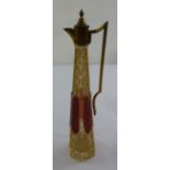 A Bohemian overlaid gilded glass claret jug with angled handle and domed hinged cover
