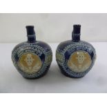 A pair of Doulton Lambethware flasks for Sunderland Old Highland Whisky, marks to the base