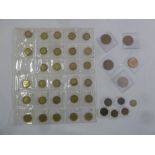 A quantity of GB coins to include threepences, pennies, farthings and a 1952 sixpence