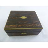 A Coromandel rectangular humidor with brass mounts, cedarwood lining and hinged cover