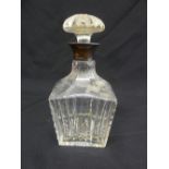 A cut glass decanter of tapering rectangular form with silver collar and drop stopper, Birmingham