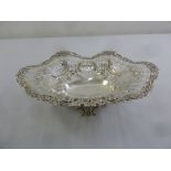A Victorian silver fruit basket, flroal and scroll border with pierced sides on raised base with