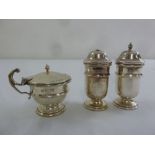 Silver three piece condiment set of banded cylindrical form, Birmingham 1955