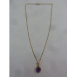 9ct yellow gold necklace with 9ct yellow gold and amethyst pendant, approx total weight 2.9g