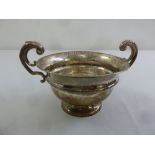 A silver two handled trophy cup on raised circular base, Birmingham 1907