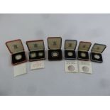 A quantity of silver coins to include 1995 œ2 Piedfort with COA, 1983 œ1 Piedfort and œ1 proof