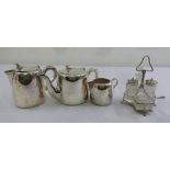 A three piece silver plated teaset and a four bottle condiment set