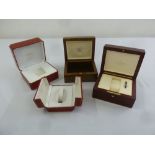 Two Patek Philippe veneered watch boxes and two Cartier watch boxes