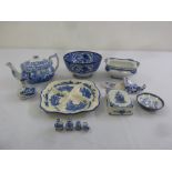 A quantity of blue and white porcelain to include a teapot, dishes and bowls (12)