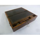 An Edwardian rectangular writing slope with brass handles and side drawer