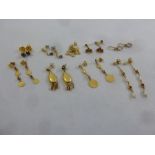 Nine pairs of gold and precious stone earrings, approx total weight 18.0g