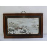 A Chinese early 20th century hand painted porcelain panel of a snowy landscape in hardwood frame,