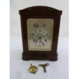 Jonghams of Nuremberg a rectangular mahogany cased mantle clock, silvered dial with Arabic numerals,