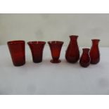 Six Whitefriars red glass vases of various shape and form