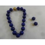 Lapis Lazuli bead necklace and a pair of matching earrings