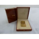 S.T. Dupont gold plated cigarette lighter in original packaging