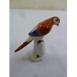 A Meissen figurine of a bird, marks to the base