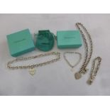 Four Tiffany chains and bracelets in original packaging