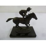 A David Cornell bronze figurine of Horse and Jockey titled Champion Finish, signed to the base,