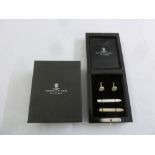 A cased set of silver cufflinks and matching collar bones by Turnball and Asser