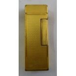 Dunhill gold plated engine turned rectangular cigarette lighter, A/F