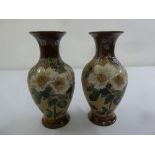 A pair of Doulton Slaters baluster vases decorated with flowers and leaves, marks to the base