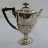 A silver coffee pot, vase form part fluted on raised oval base, London 1903